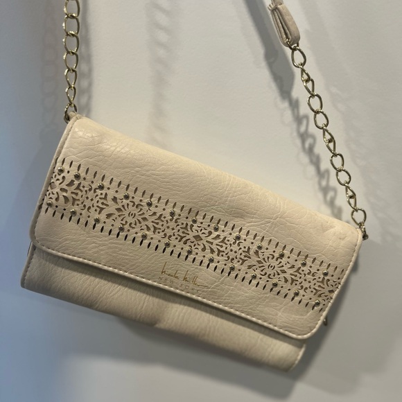 Nicole Miller Handbags - Nicole Miller Cream Clutch with Chain Strap